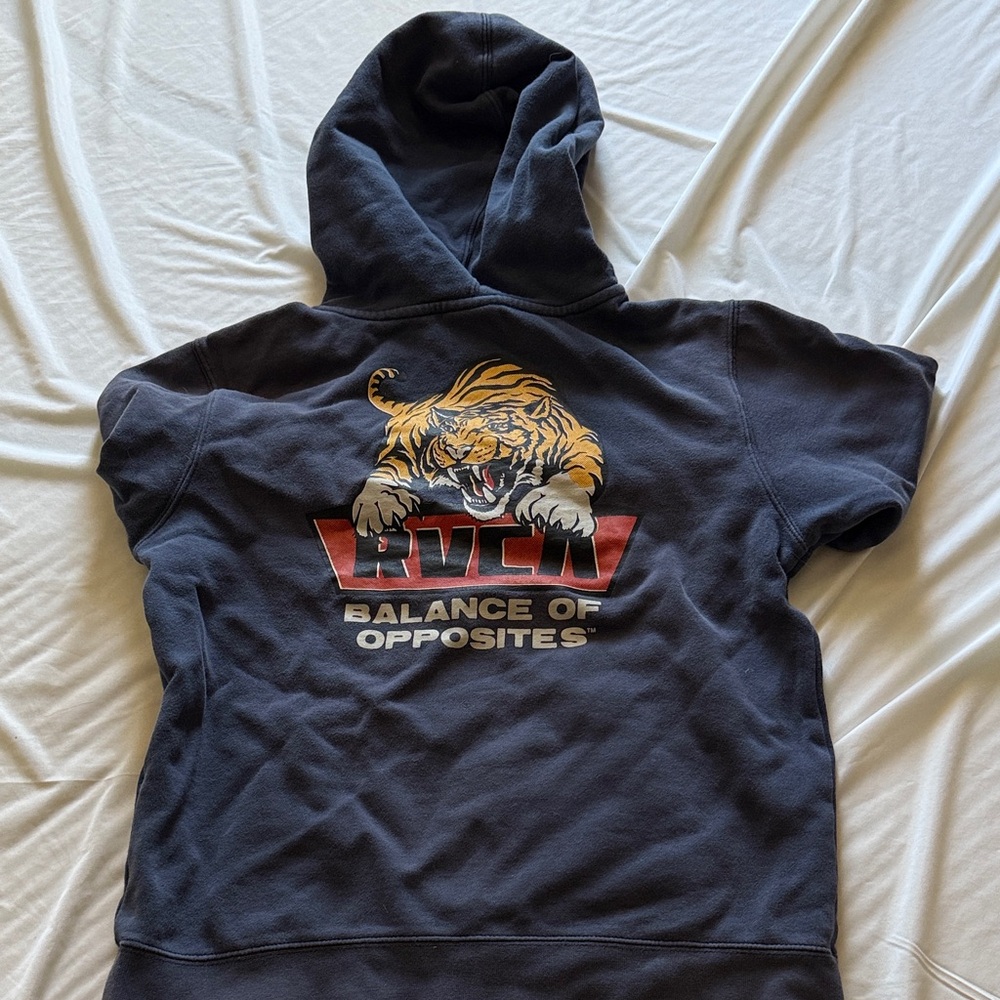 RVCA boy’s fit size XL Blue with Tiger Hoodie (balance of opposites at the back)